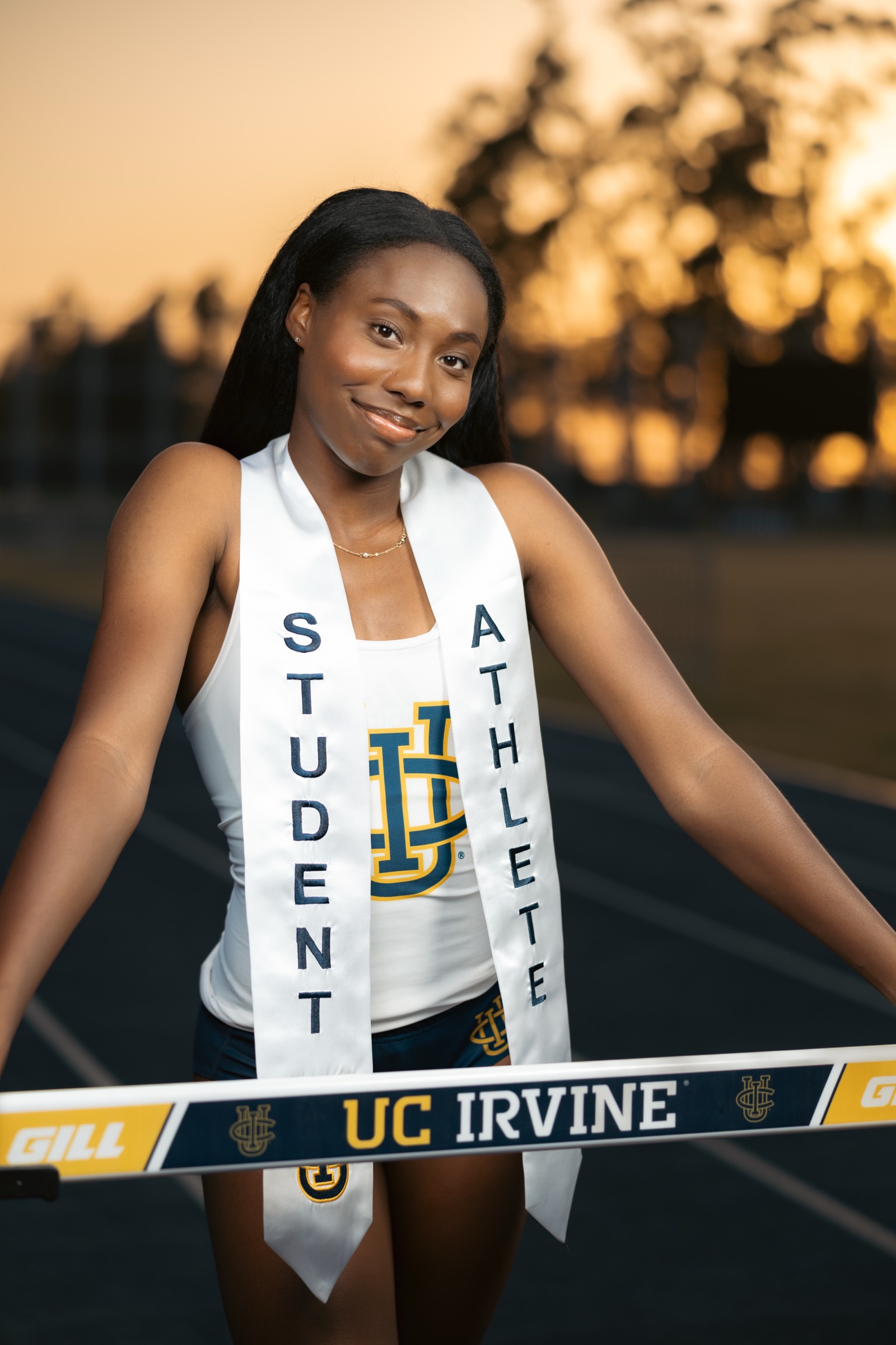 UCI student athlete at sunset on track