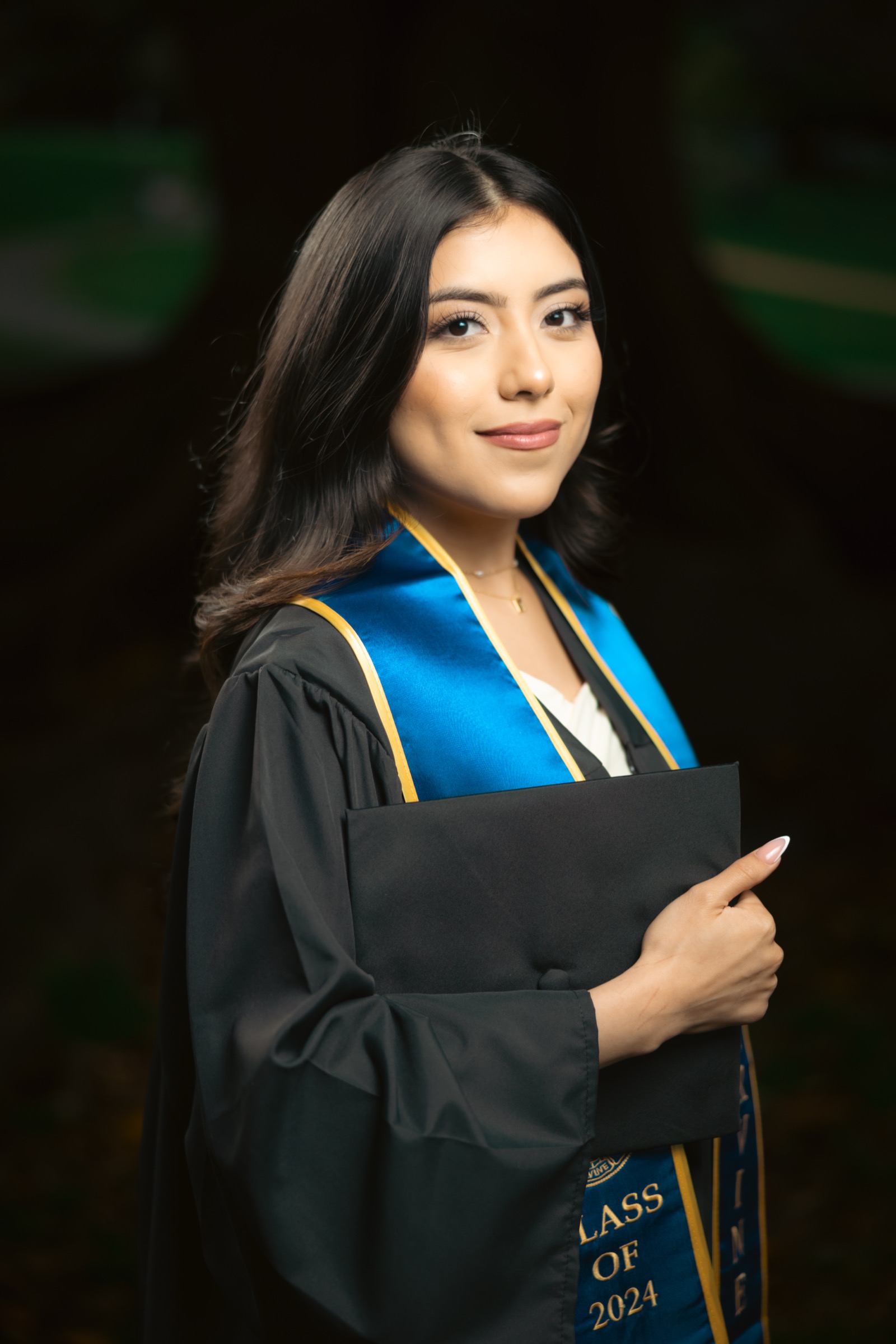 UCI graduation portrait at campus colonnade