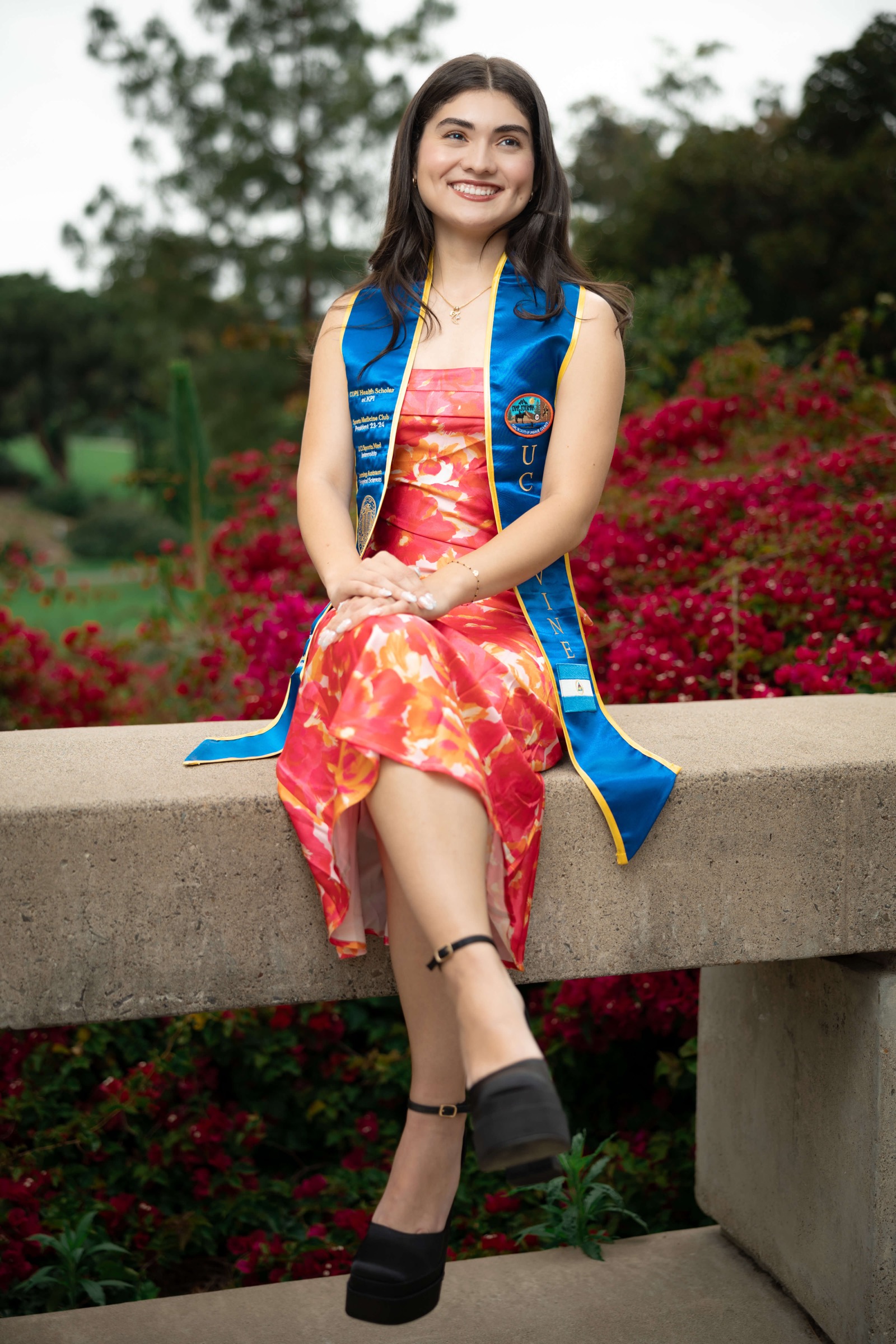 USC doctoral graduate in red regalia