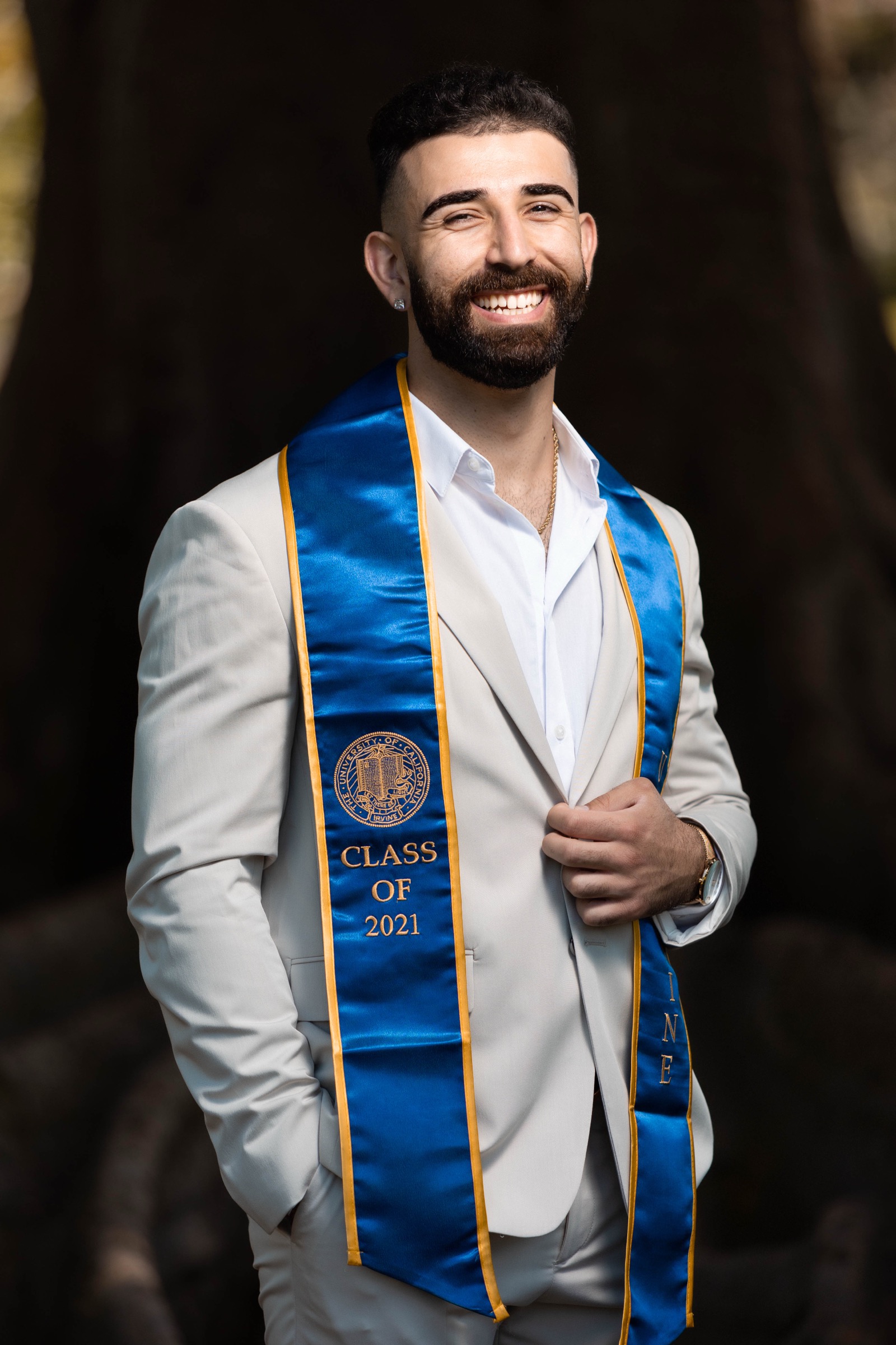 UCI graduate in wildflower field