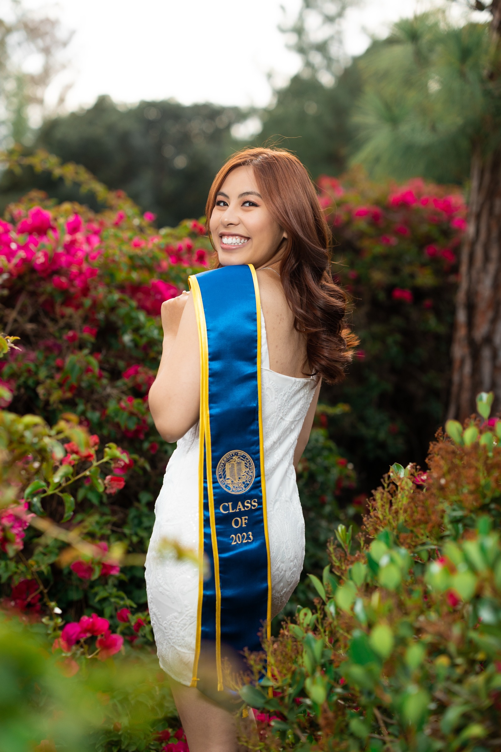 USC graduate with colorful sash