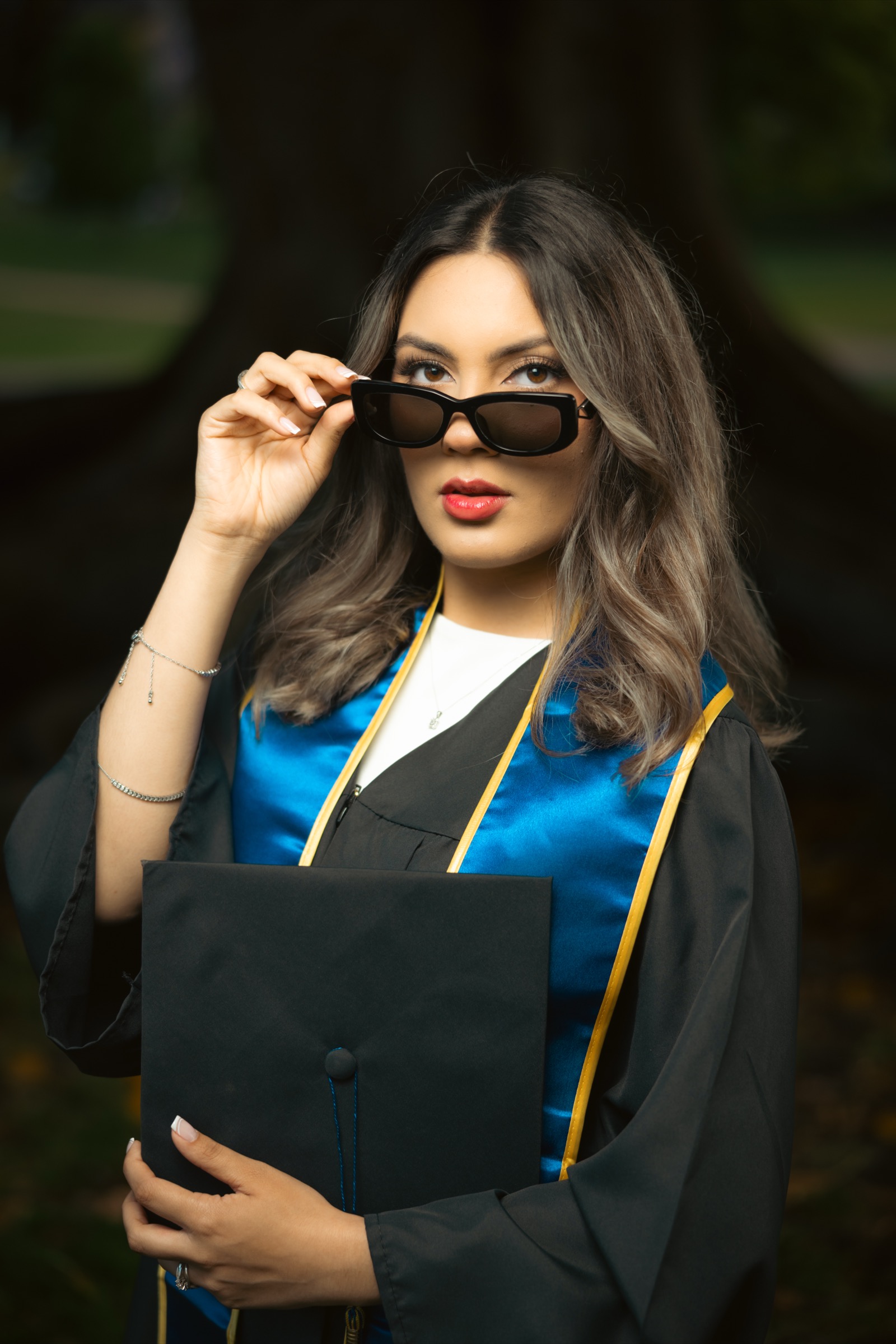 UCI graduate reading in library