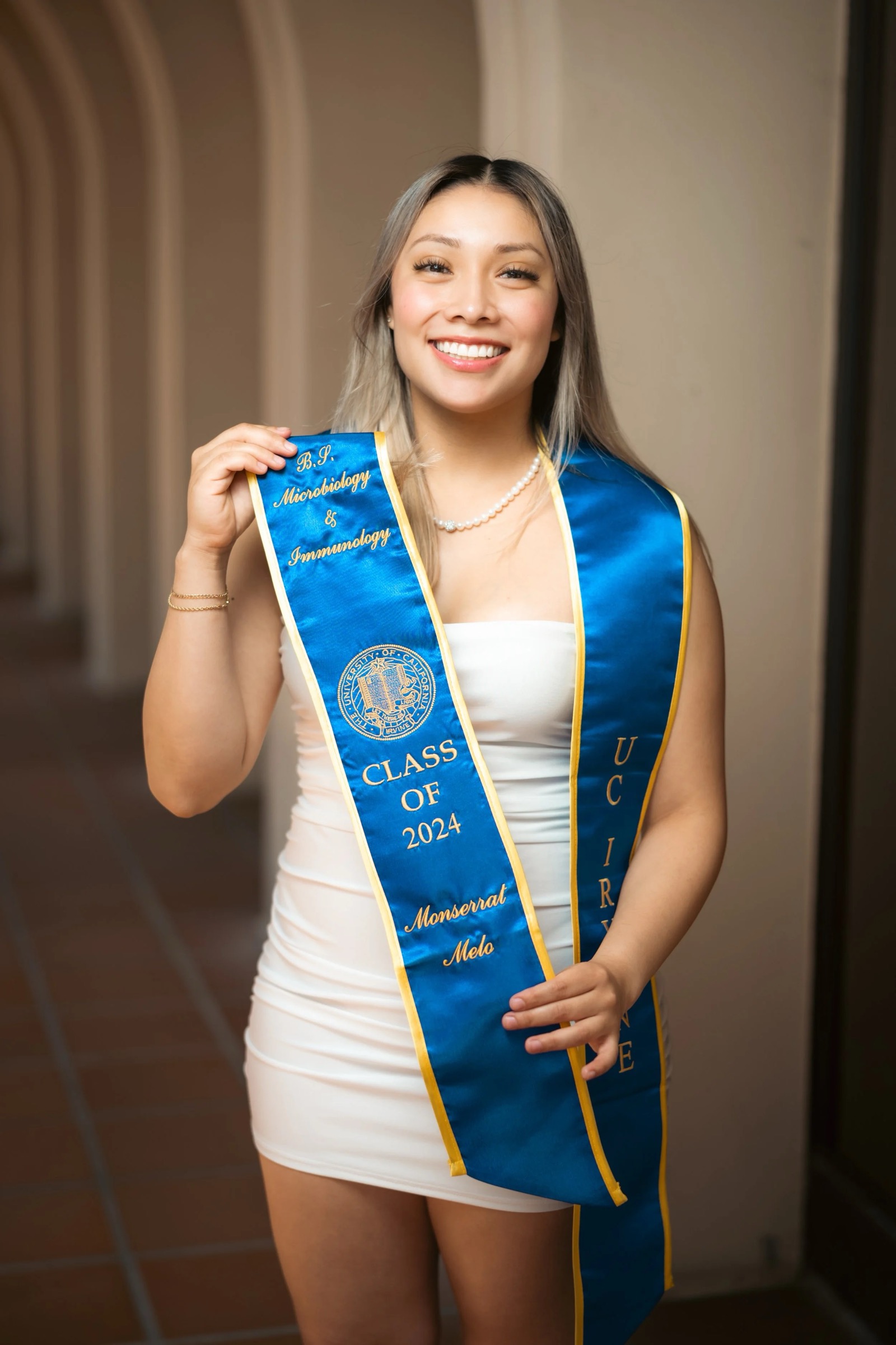Tommy Trojan statue graduation photo at USC
